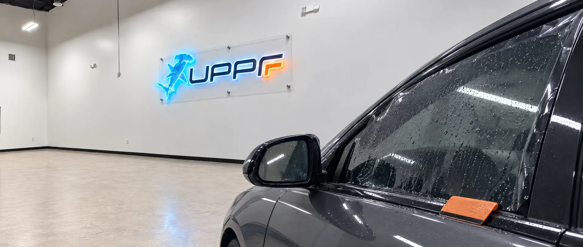 Ceramic window tint installation at UPPF Studio Houston